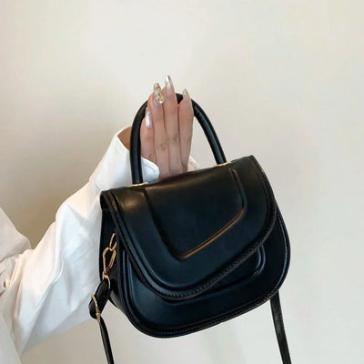 Novessa | Luxe Statement Minimalist Saddle Bag